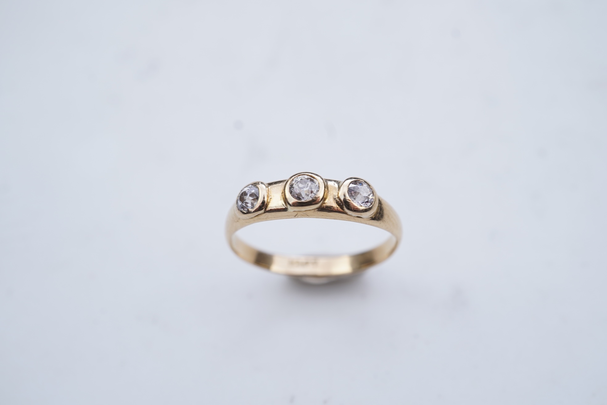 A three-stone diamond ring